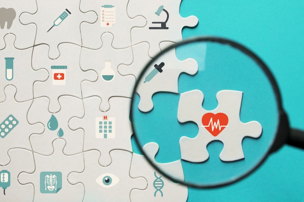 icones medicos puzzle com lupa
