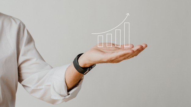 grafico de barras digital crescente com sobreposicao de mao de empresario
