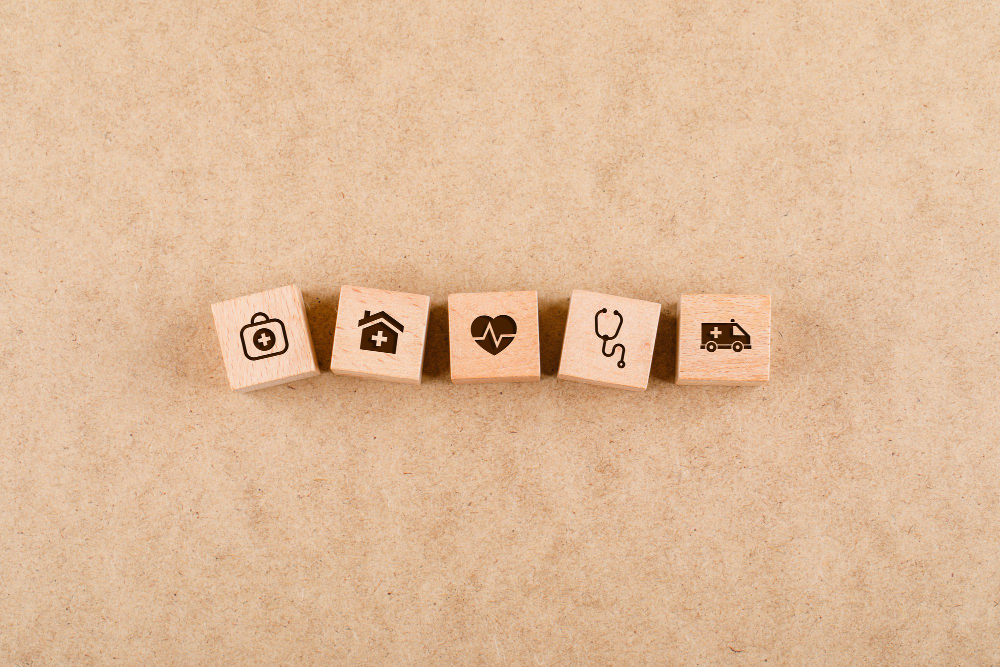 medical check up concept with wooden blocks with medical icons flat lay