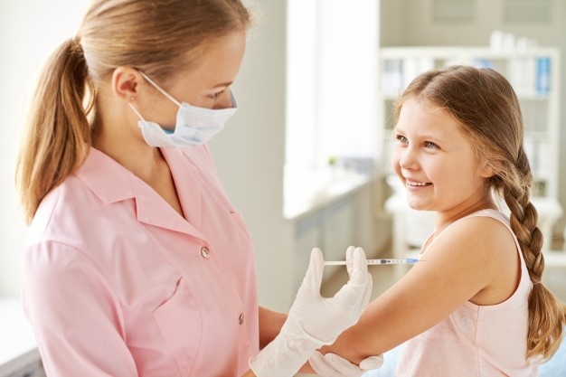 nutra a injeccao uma menina de sorriso