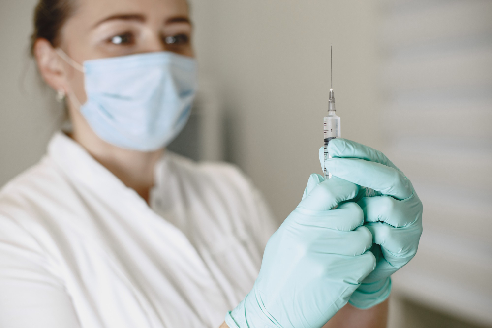 closeup of syringe and injection vial flu measles coronavirus covid vaccine disease prepare for human