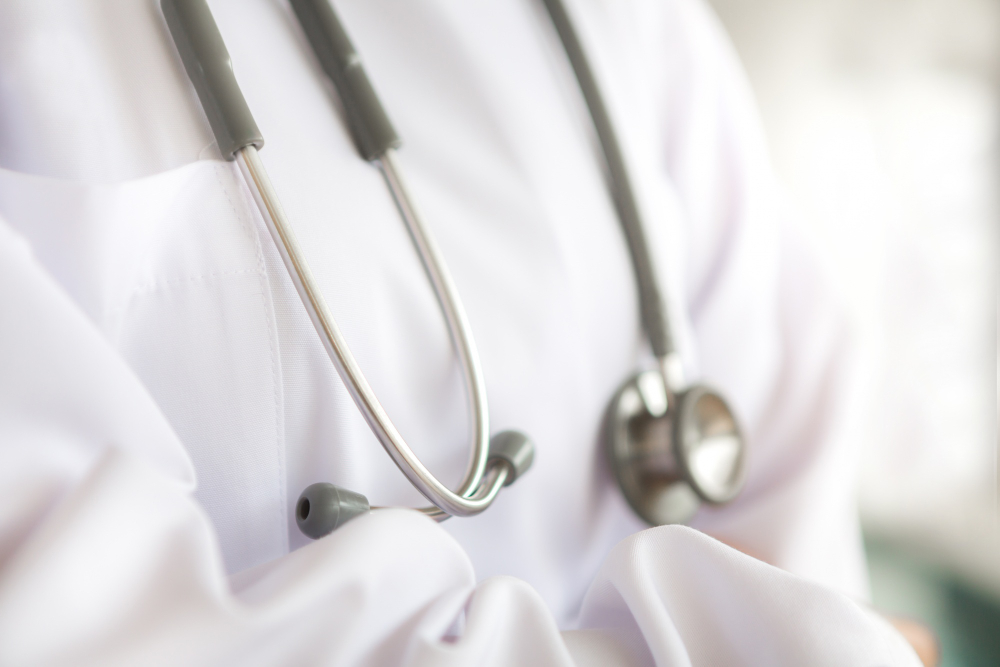 stethoscope hanging from a doctor s gown