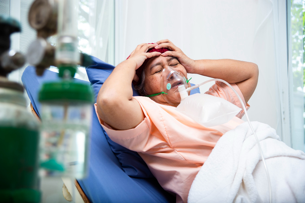 asian elderly woman patients headache in hospital
