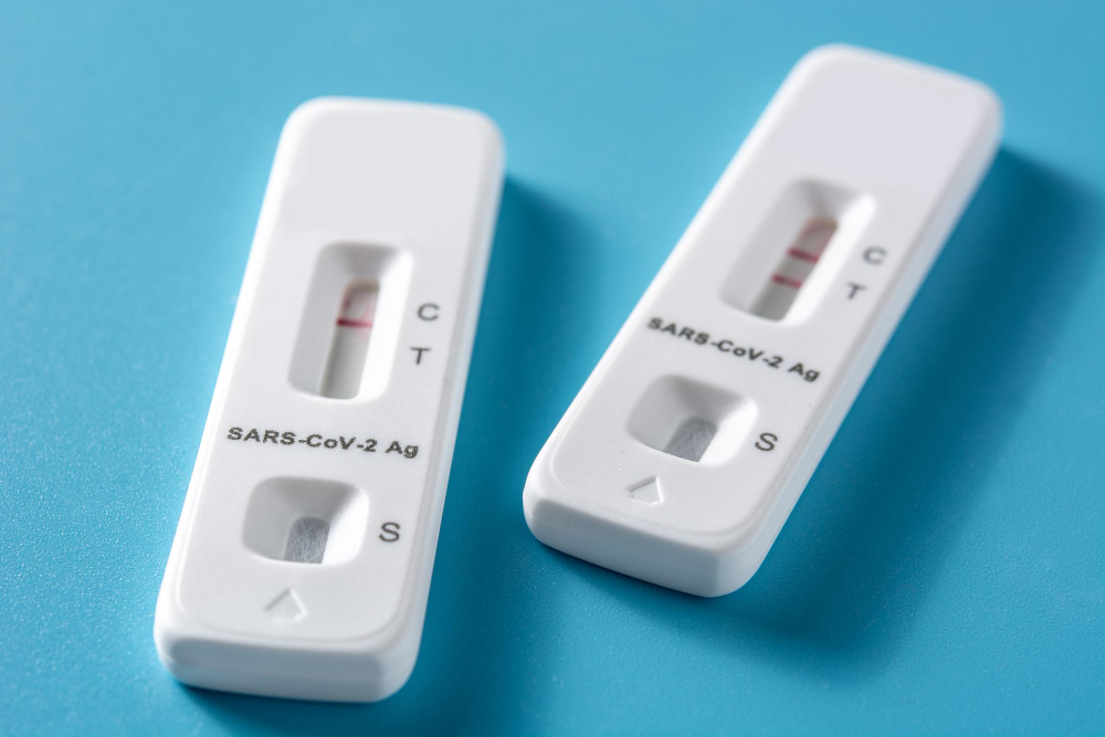 covid rapid antigen test on blue background