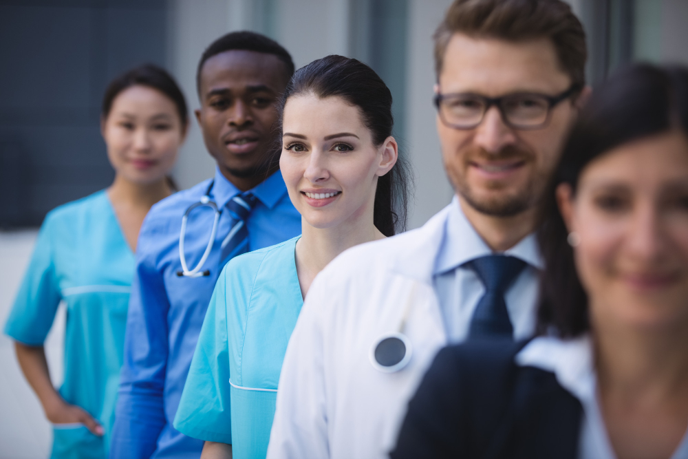 team of doctors standing in row