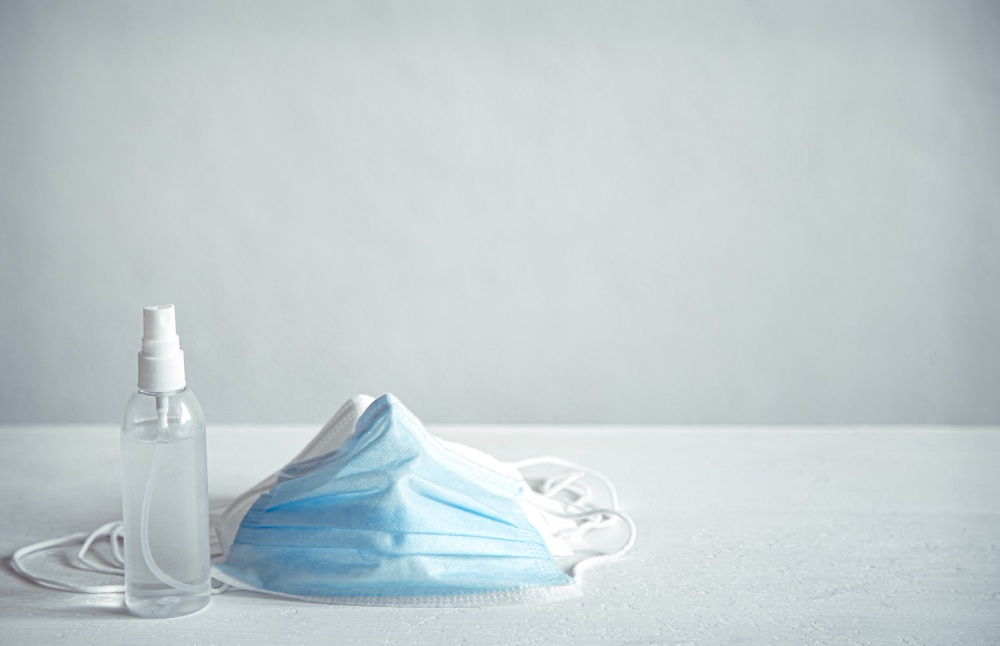 coronavirus prevention hand sanitizer and protection face masks against coronavirus