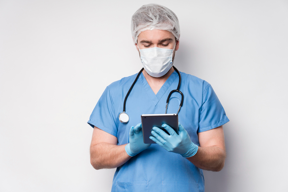 portrait of nurse browsing tablet