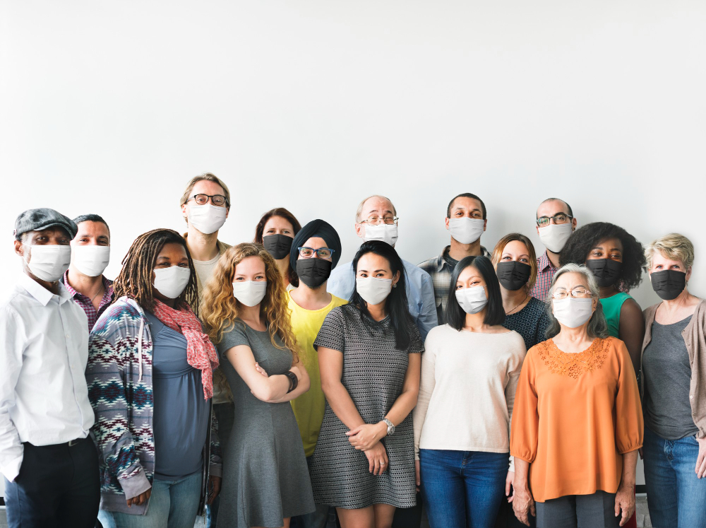 diverse startup business people with masks in the new normal
