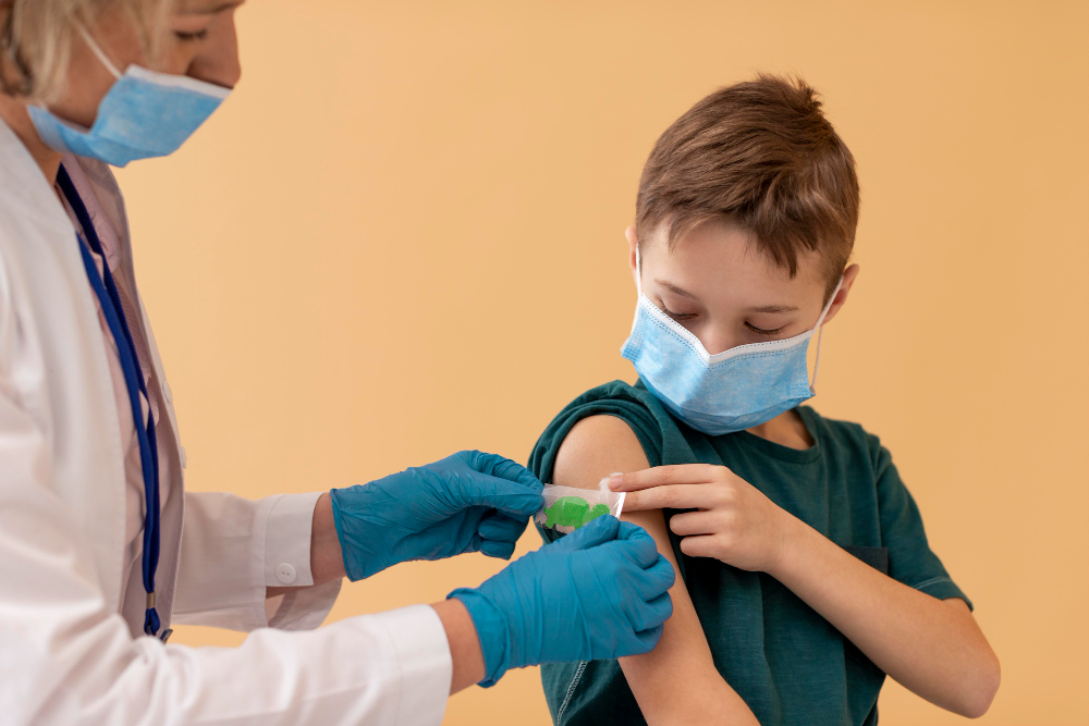 close up kid and doctor wearing masks