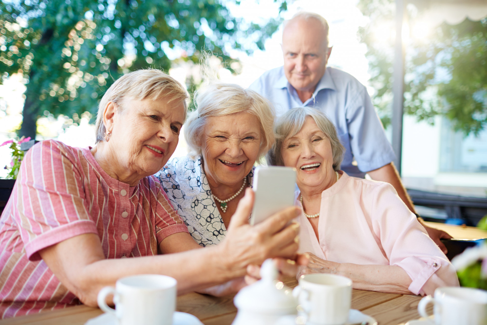 modern seniors taking picture of themselves