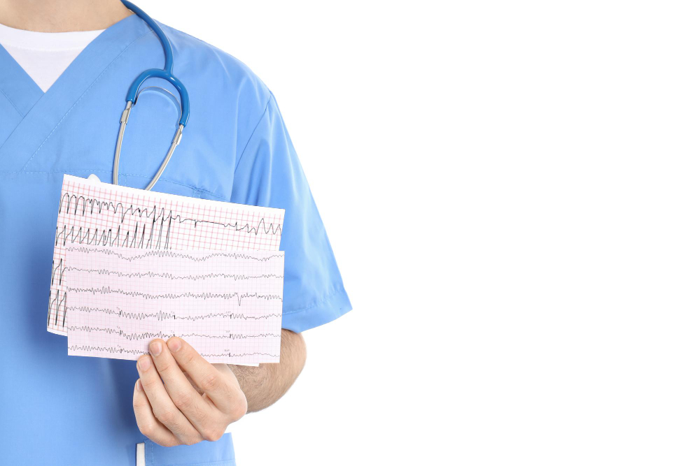 intern doctor holding cardiogram isolated on white background