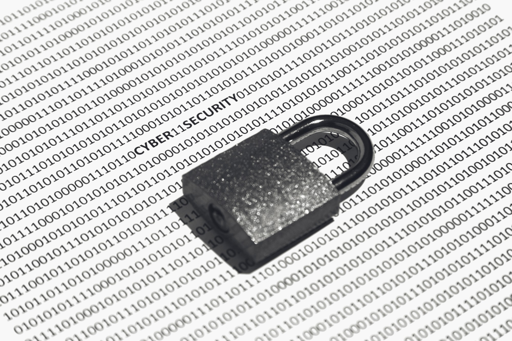 closeup shot of a lock on a white surface with binary code on it concept of cybersecurity