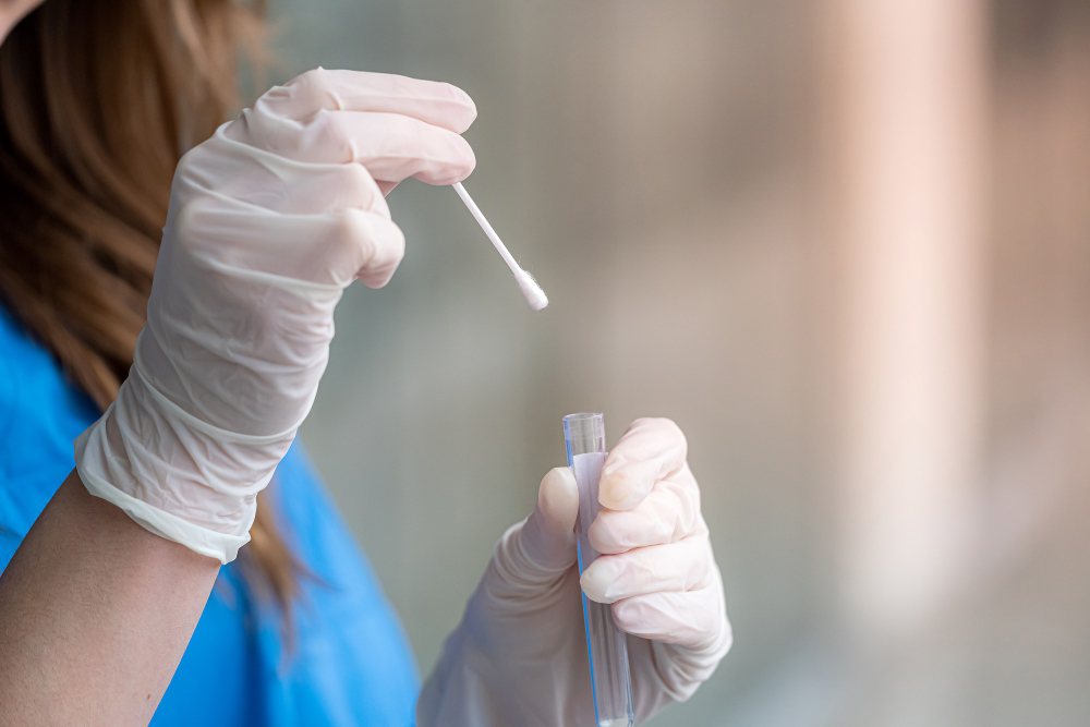 closeup nurse with nasal swab laboratory test coronavirus covid