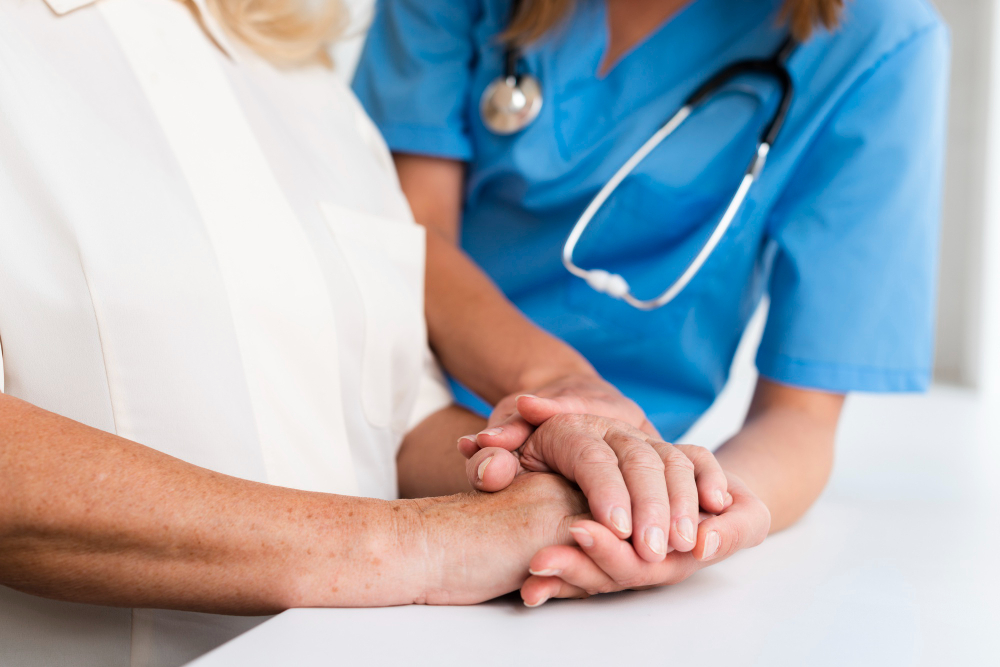 doctor old woman holding hands close up