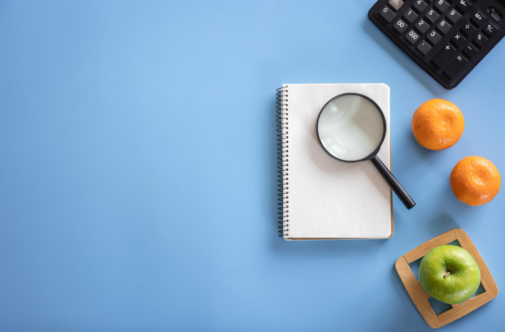 flat lay composition with notepad on blue background diet nutrition concept