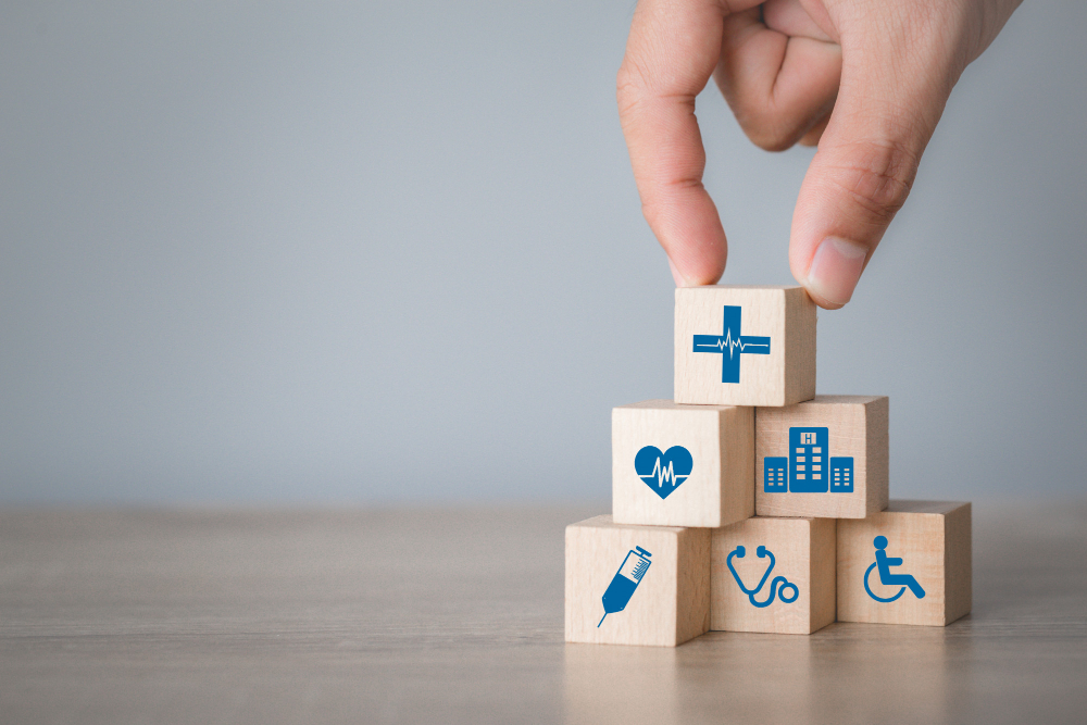 hand arranging wood block stacking with icons