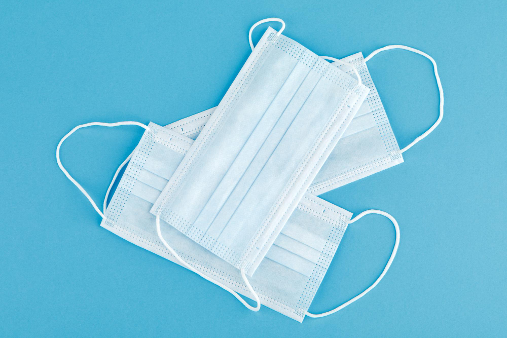 medical mask medical protective mask isolated on a blue background health care coronavirus medical quarantine hygiene concept