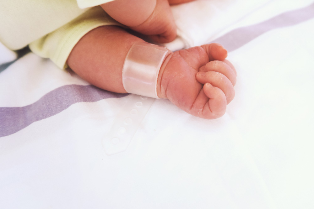 newborn baby first days life delivery room infant asleep hospital after childbirth
