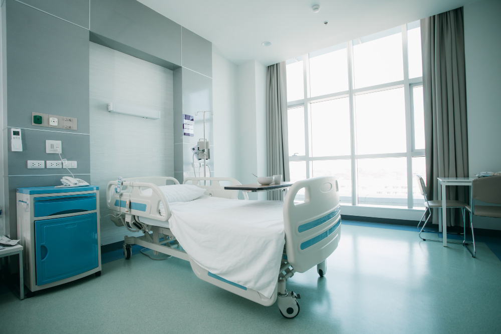 recovery room with beds and comfortable medical interior of an empty hospital room clean and empty room with a bed in the new medical center