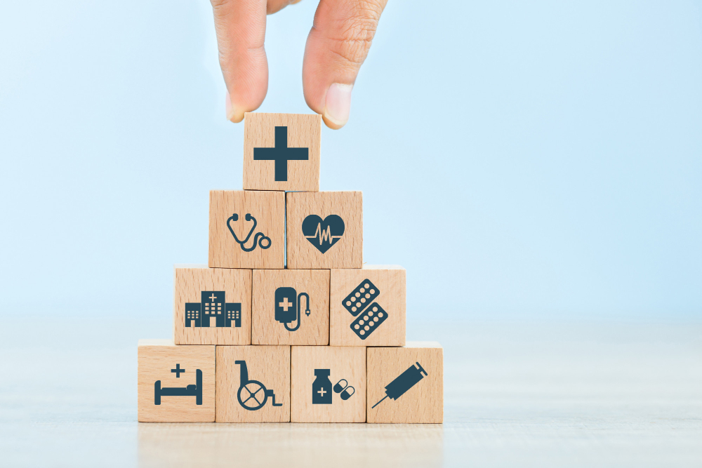 health insurance concept hand arranging wood block stacking with icon healthcare medical