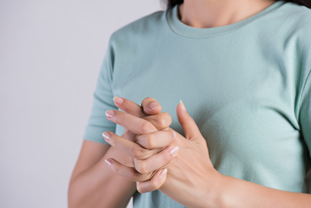 healthcare medical concept close up woman cracking knuckles