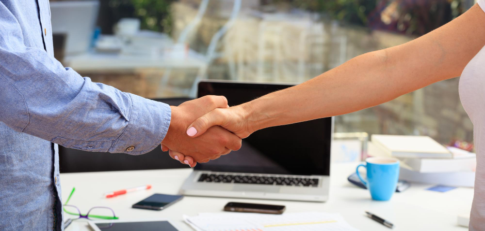 business handshake office ()