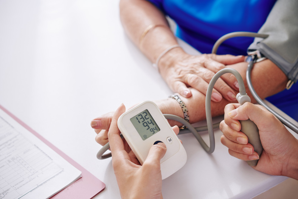 measuring blood pressure elderly woman