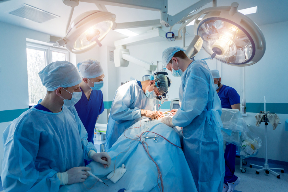 spinal surgery group surgeons operating room with surgery equipment