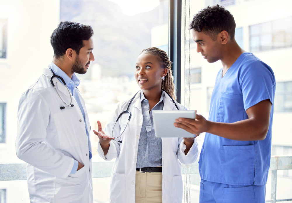 shes got perfect plan shot group doctors using digital tablet work