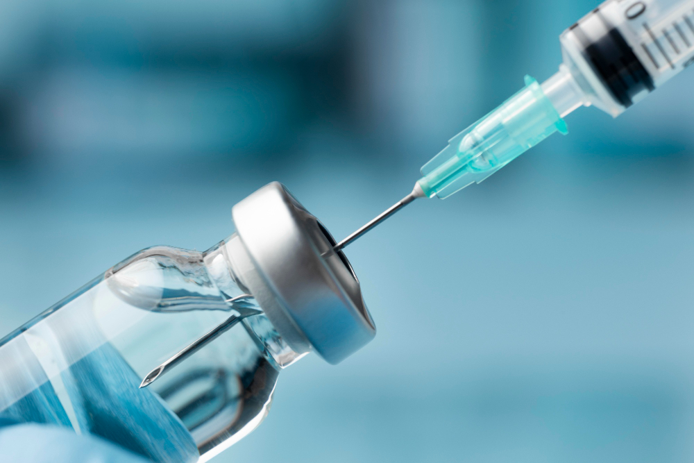 covid still life with vaccine ()