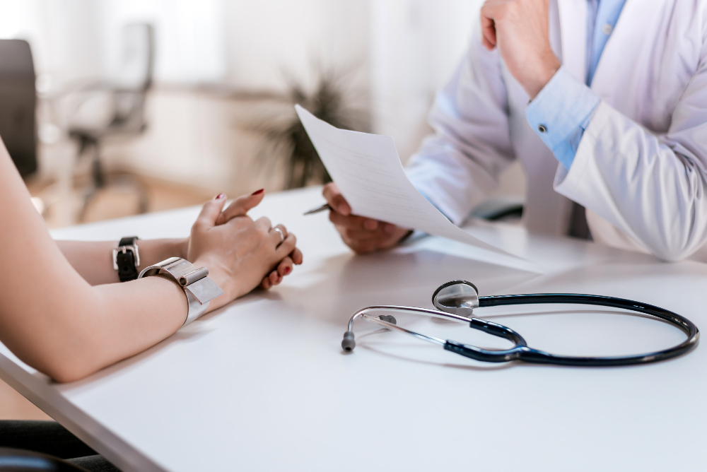doctor talking with patient medical diagnosis
