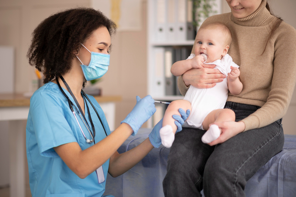 little baby being health clinic vaccination
