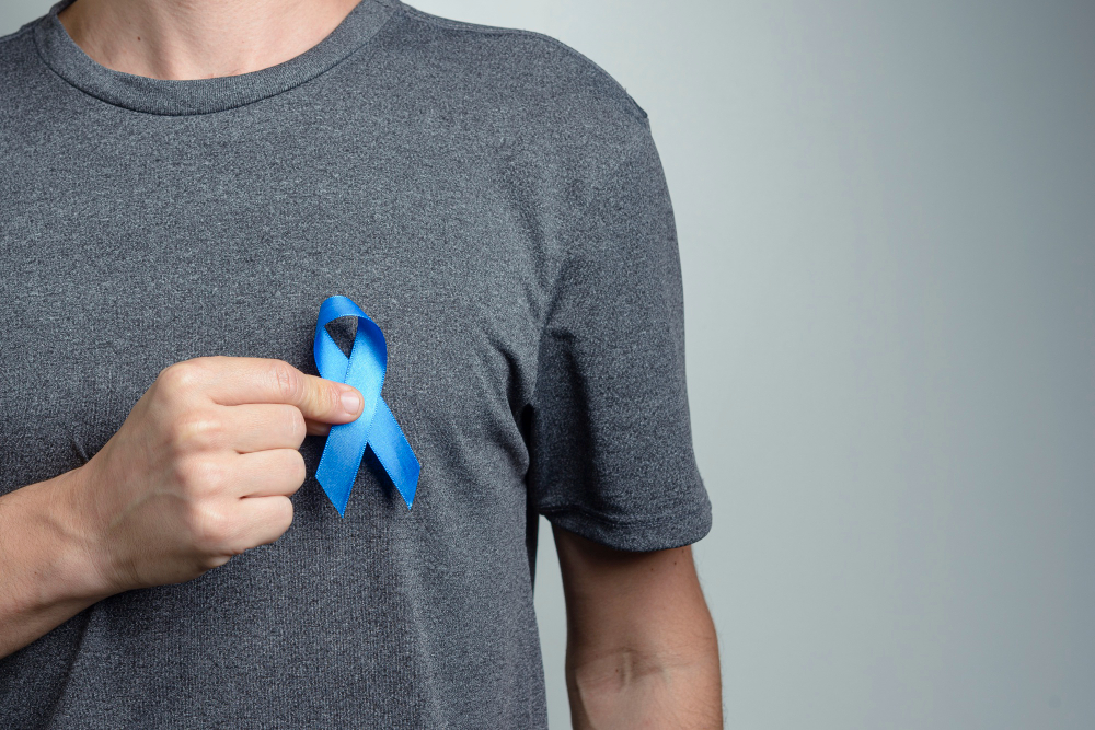 close up man hand showing ribbon awareness