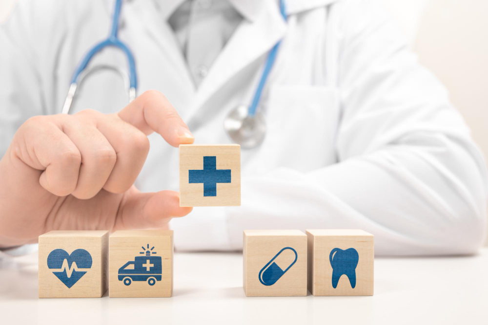 doctor hand choose cross sign wood cube block healthcare medical icon wooden blocks doctor white coat arranging cubes with medical symbols desk healthcare insurance concept