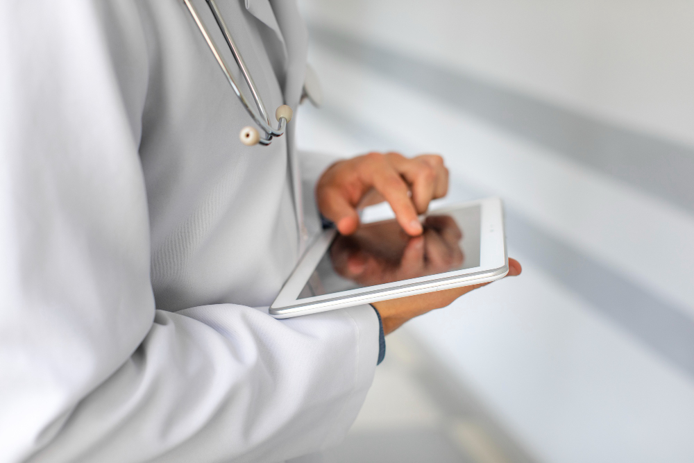 doctor hands using modern tablet
