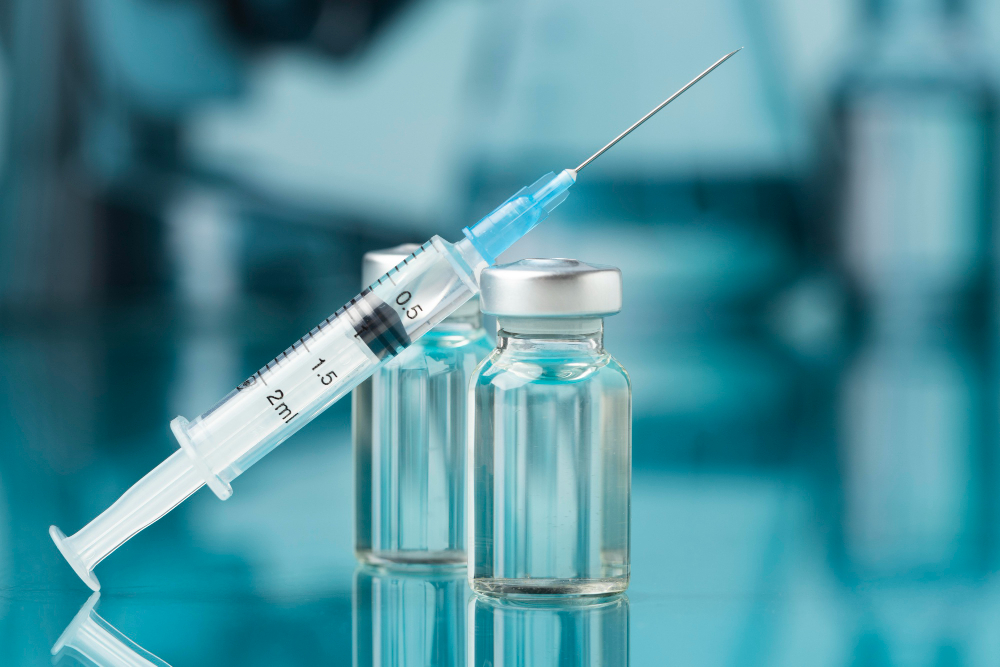 covid still life with vaccine