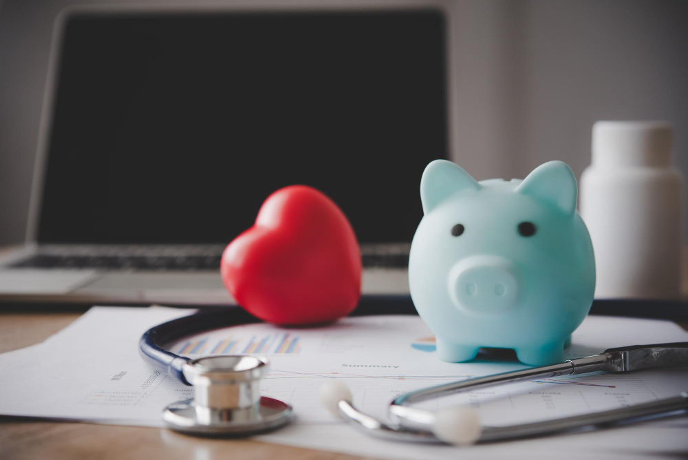 medical insurance concept with piggy bank stethoscope wooden desk