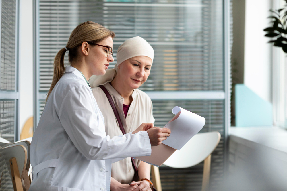 middle aged woman with skin cancer talking with her doctor