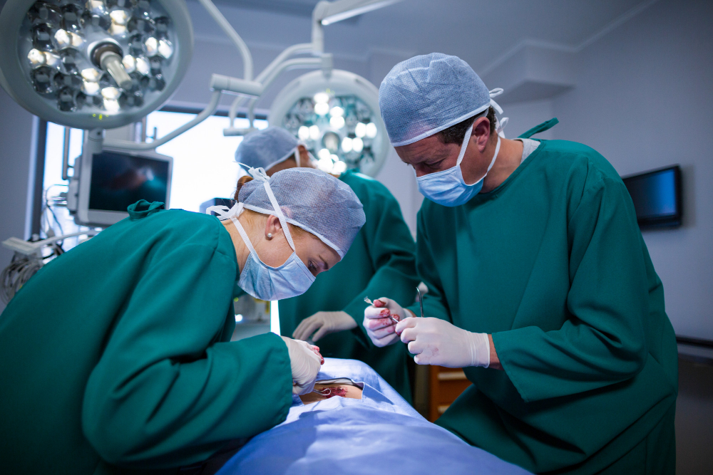 surgeons performing operation operation theater