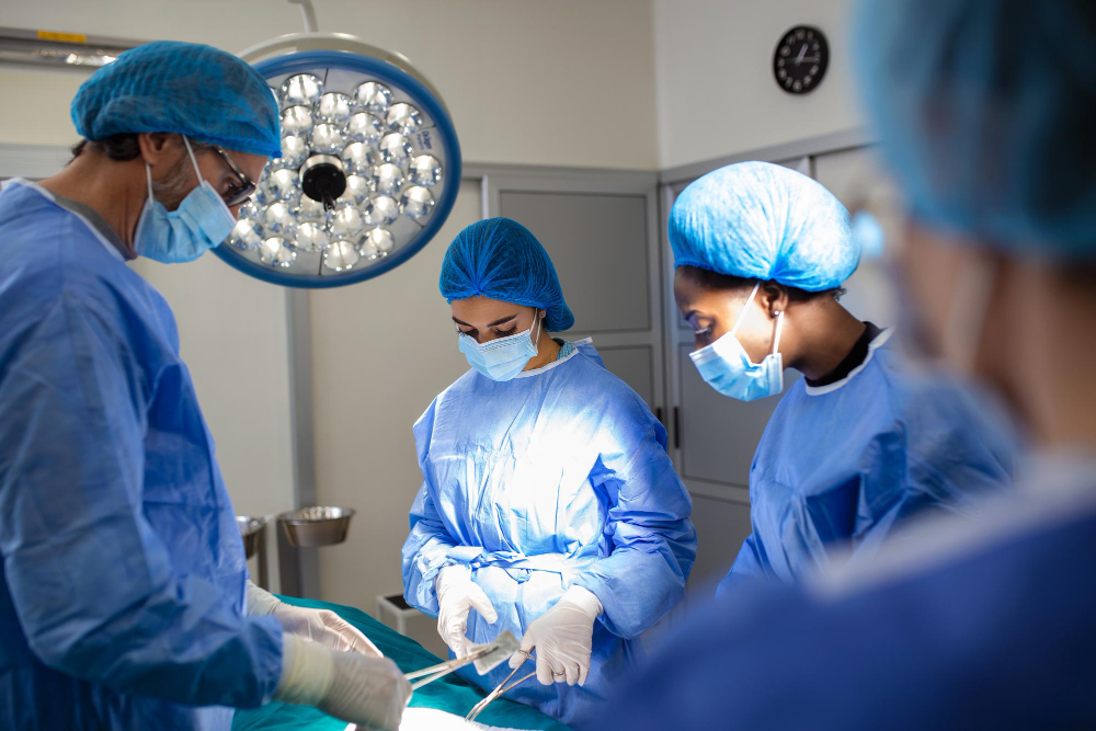 surgery operation group surgeons operating room with surgery equipment medical background selective focus surgeon team working together while operation