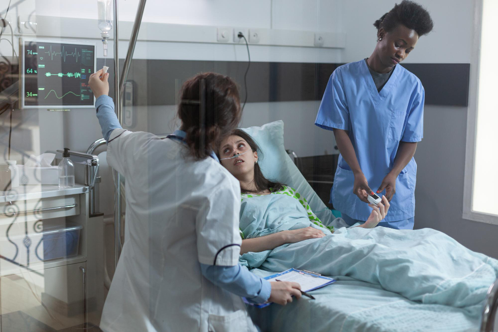 nurse putting pulse oximeter patient finger while doctor setting up central line catether with iv drip medication woman hospital bed with low oxygen saturation recieving medical care