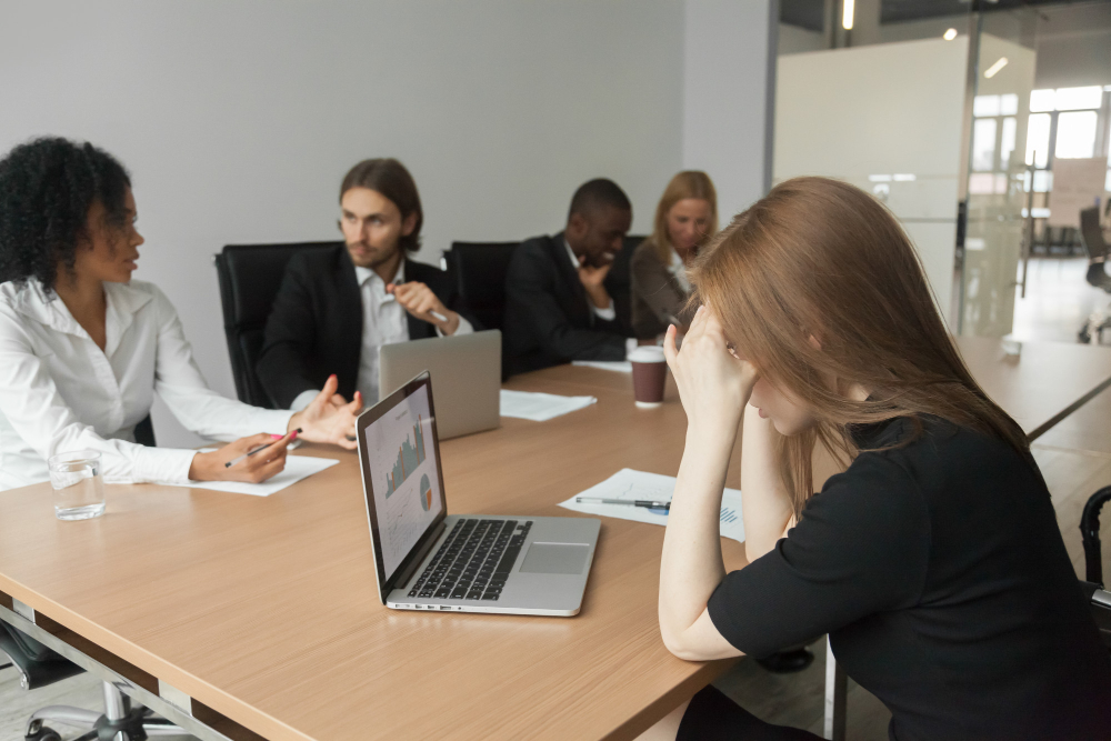 puzzled serious businesswoman concerned about project statistics group meeting