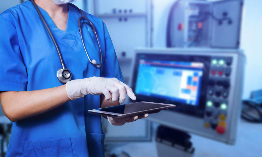female doctor wearing scrubs hospital using digital tablet with cinematography screensmart medical doctor working